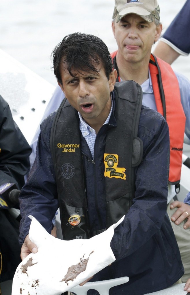Bobby Jindal shows reporters the mess he's created.