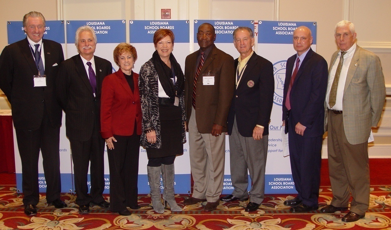Thick as thieves: LFT President Steve Monaghan (2nd from left), former LAE President Debbie Meaux (3rd from left), former Louisiana Association of School Superintendents President Patrice Pujol (4th from left), LSBA Executive Director Scott Richard (2nd from right) and anti-CCSS legislator J. Rogers Pope (right).